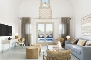 Sea Breeze Santorini Beach Resort, Curio Collection by Hilton livingroom
